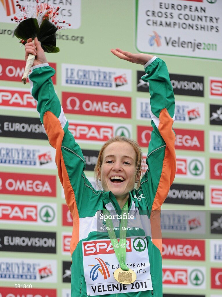 11 December 2011; Fionnuala Britton, Ireland, celebrates after being presented with her gold medal following her Senior Women's event victory at the 18th SPAR European Cross Country Championships 2011. Velenje, Slovenia. Picture credit: Stephen McCarthy / SPORTSFILE