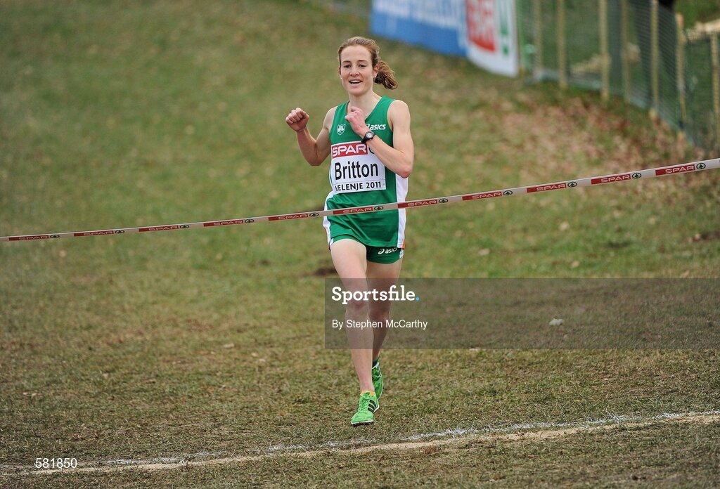 11 December 2011; Fionnuala Britton, Ireland, celebrates on her way to winning the Senior Women's event at the 18th SPAR European Cross Country Championships 2011. Velenje, Slovenia. Picture credit: Stephen McCarthy / SPORTSFILE