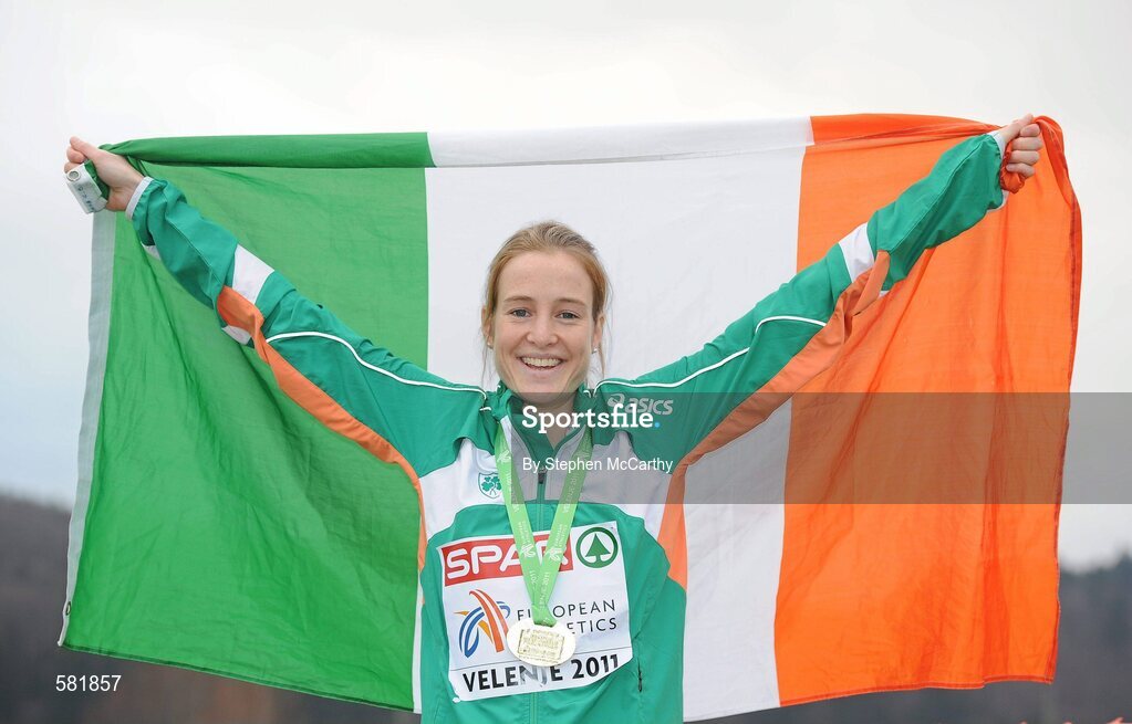 11 December 2011; Fionnuala Britton, Ireland, celebrates with her gold medal after winning the Senior Women's event at the 18th SPAR European Cross Country Championships 2011. Velenje, Slovenia. Picture credit: Stephen McCarthy / SPORTSFILE