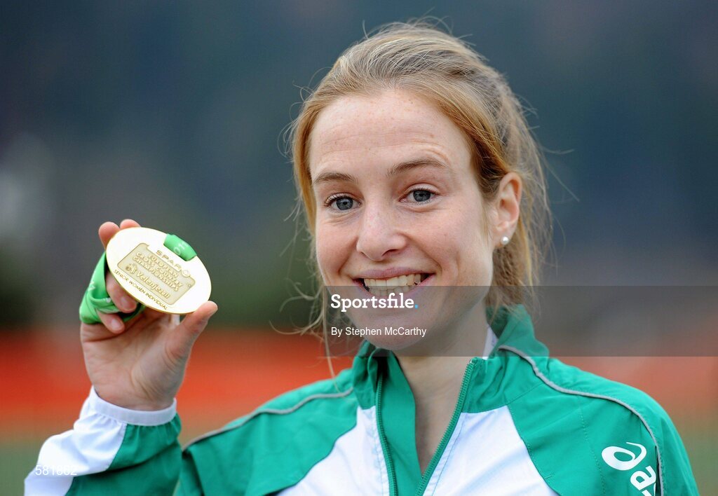 11 December 2011; Fionnuala Britton, Ireland, celebrates with her gold medal after winning the Senior Women's event at the 18th SPAR European Cross Country Championships 2011. Velenje, Slovenia. Picture credit: Stephen McCarthy / SPORTSFILE