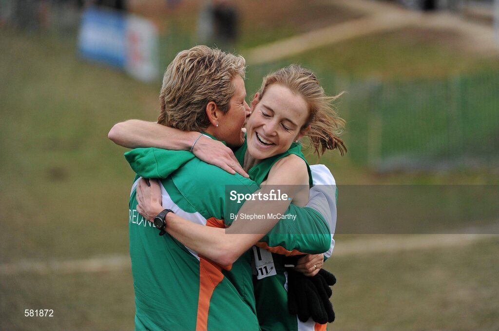 11 December 2011; Fionnuala Britton, Ireland, celebrates with team manager Anne Keenan Buckley after winning the Senior Women's event at the 18th SPAR European Cross Country Championships 2011. Velenje, Slovenia. Picture credit: Stephen McCarthy / SPORTSFILE