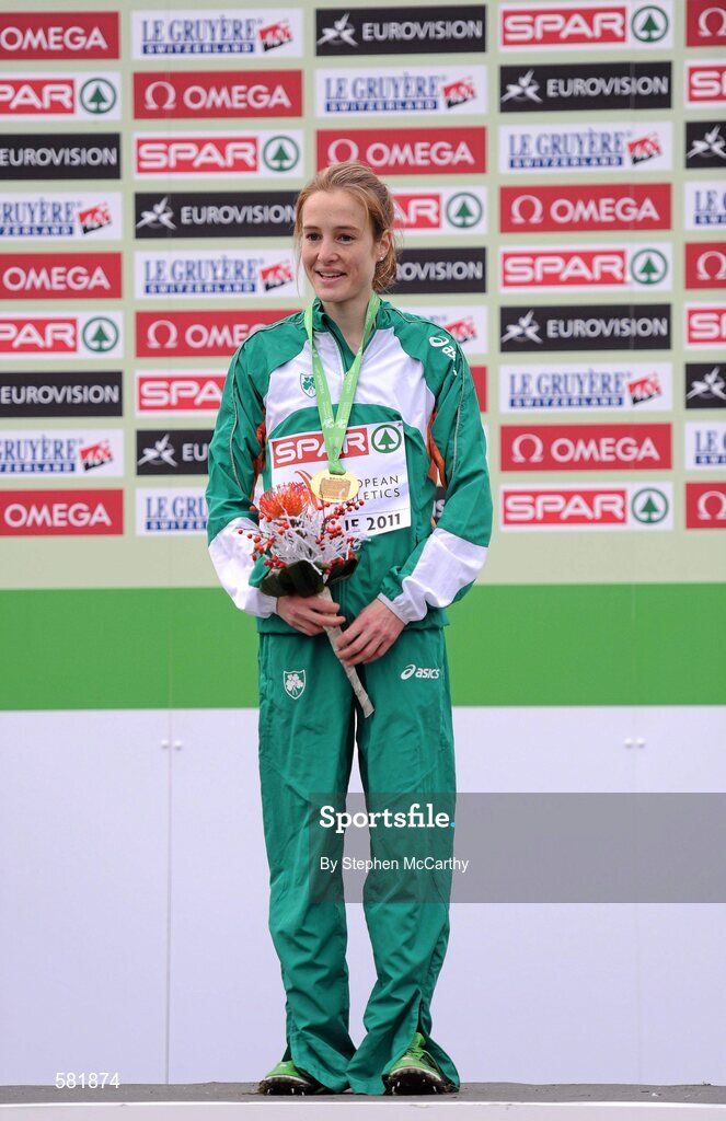 11 December 2011; Fionnuala Britton, Ireland, after being presented with her gold medal following her Senior Women's event victory at the 18th SPAR European Cross Country Championships 2011. Velenje, Slovenia. Picture credit: Stephen McCarthy / SPORTSFILE
