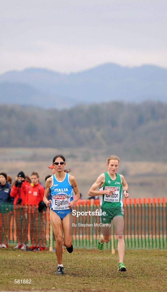 11 December 2011; Fionnuala Britton, Ireland, leads the field, including Nadia Ejjafini, Italy, on her way to winning the Senior Women's event at the 18th SPAR European Cross Country Championships 2011. Velenje, Slovenia. Picture credit: Stephen McCarthy / SPORTSFILE