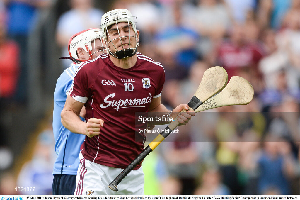28 May 2017; Jason Flynn of Galway celebrates scoring his side's first goal as he is tackled late by Cian O'Callaghan of Dublin during the Leinster GAA Hurling Senior Championship Quarter-Final match between Galway and Dublin at O'Connor Park, in Tullamore, Co. Offaly.  Photo by Piaras Ó Mídheach/Sportsfile