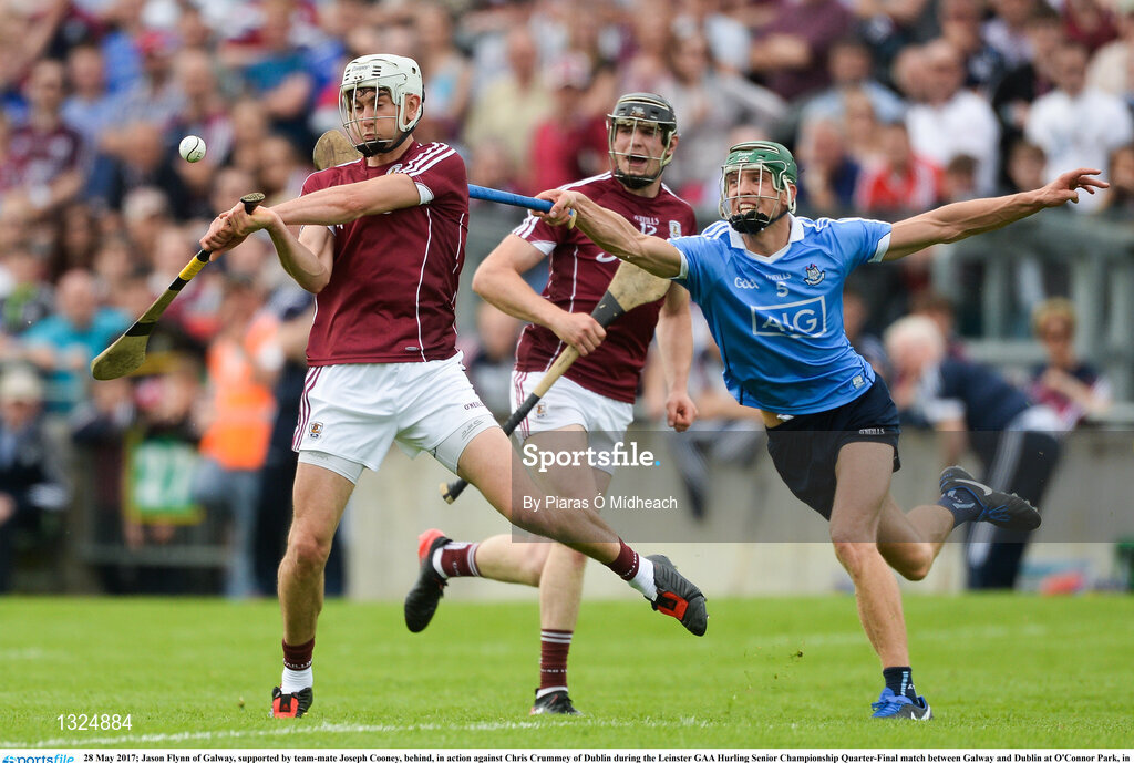 28 May 2017; Jason Flynn of Galway, supported by team-mate Joseph Cooney, behind, in action against Chris Crummey of Dublin during the Leinster GAA Hurling Senior Championship Quarter-Final match between Galway and Dublin at O'Connor Park, in Tullamore, Co. Offaly.  Photo by Piaras Ó Mídheach/Sportsfile