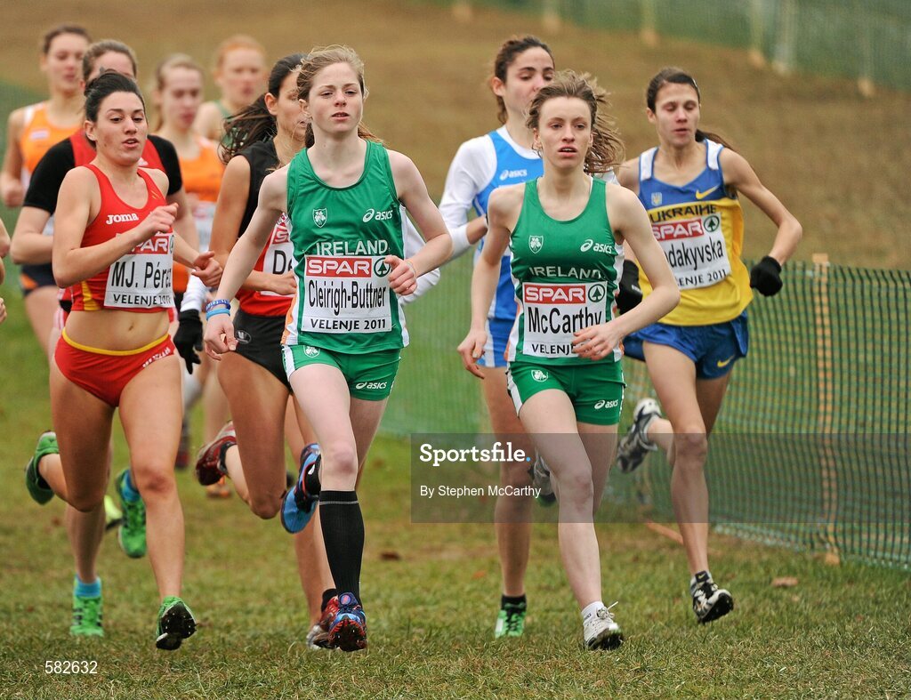11 December 2011; Siofra Cleirigh-Buttner and Clare McCarthy, Ireland,, in action during the Junior Women's event at the 18th SPAR European Cross Country Championships 2011. Velenje, Slovenia. Picture credit: Stephen McCarthy / SPORTSFILE