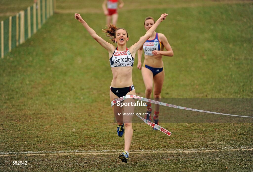 11 December 2011; Emelia Gorecka, Great Britain, celebrates winning the Junior Women's event at the 18th SPAR European Cross Country Championships 2011. Velenje, Slovenia. Picture credit: Stephen McCarthy / SPORTSFILE