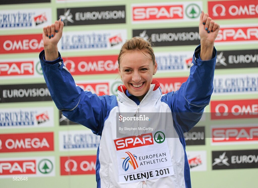 11 December 2011; Ioana Doaga, Romania, on the podium after finishing second during the Junior Women's event at the 18th SPAR European Cross Country Championships 2011. Velenje, Slovenia. Picture credit: Stephen McCarthy / SPORTSFILE