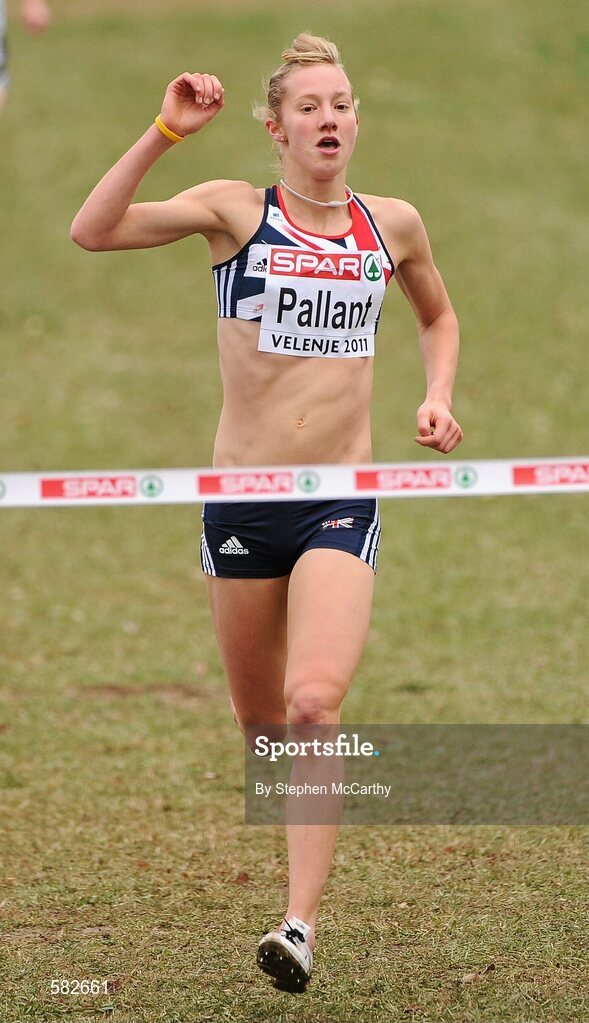 11 December 2011; Emma Pallant, Great Britain, celebrates winning the U23 Women's event at the 18th SPAR European Cross Country Championships 2011. Velenje, Slovenia. Picture credit: Stephen McCarthy / SPORTSFILE