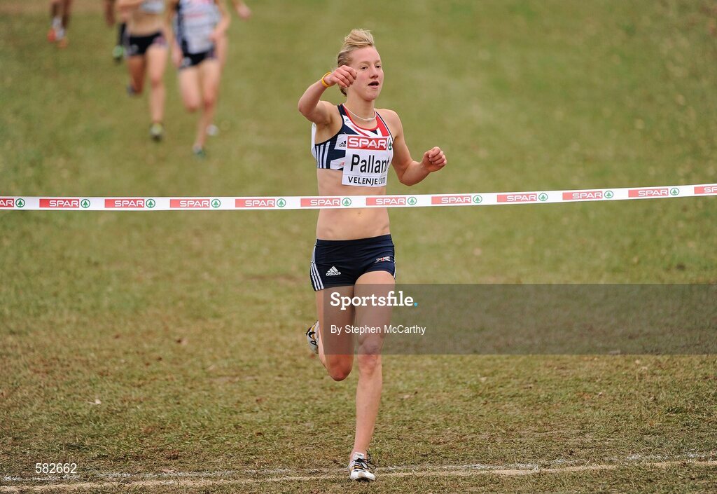 11 December 2011; Emma Pallant, Great Britain, celebrates winning the U23 Women's event at the 18th SPAR European Cross Country Championships 2011. Velenje, Slovenia. Picture credit: Stephen McCarthy / SPORTSFILE