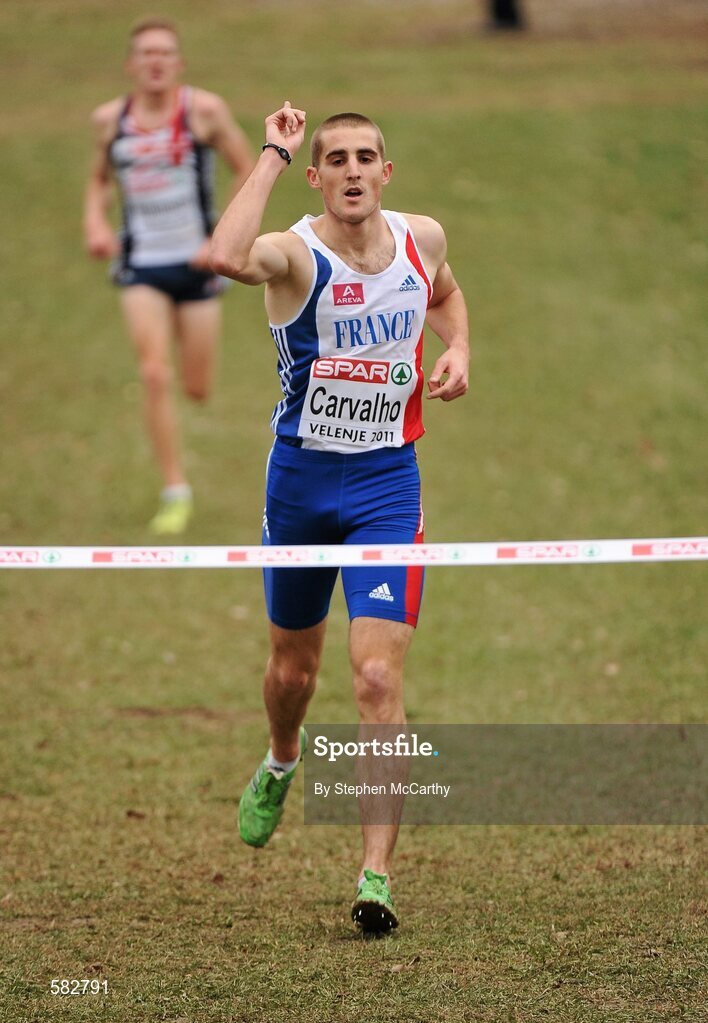 11 December 2011; Florian Carvalho, France, celebrates on his way to winning the U23 Men's event at the 18th SPAR European Cross Country Championships 2011. Velenje, Slovenia. Picture credit: Stephen McCarthy / SPORTSFILE