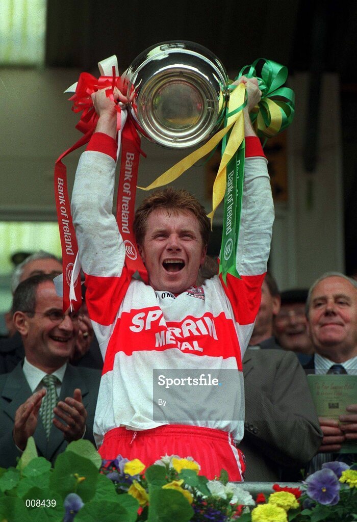 19 July 1998. Derry Captain Kieran McKeever lifts the cup after the game. Ulster Football Final, Derry v Donegal, Clones. Picture Credit Matt Browne/SPORTSFILE