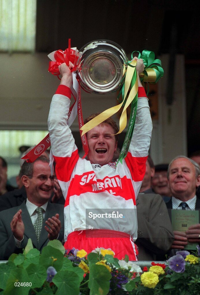 19 July 1998. Derry Captain Kieran McKeever lifts the cup after the game. Ulster Football Final, Derry v Donegal, St Tighearnach's Park, Clones. Picture credit; Matt Browne/ SPORTSFILE
