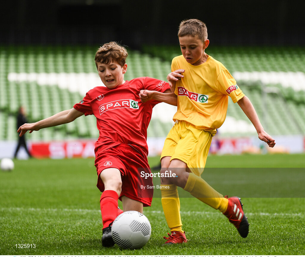 31 May 2017; Zach Lynch of Scoil an Athar Tadhg, Co Cork, in action against Kevin McCormack of Dooish NS, Co Donegal, during the SPAR FAI Primary School 5s National Finals at Aviva Stadium, in Lansdowne Rd, Dublin 4. Photo by Sam Barnes/Sportsfile