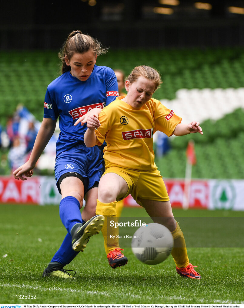 31 May 2017; Amber Cosgrove of Boyerstown NS, Co Meath, in action against Rachael NÍ Fhríl of Scoil Mhuire, Co Donegal, during the SPAR FAI Primary School 5s National Finals at Aviva Stadium, in Lansdowne Rd, Dublin 4. Photo by Sam Barnes/Sportsfile