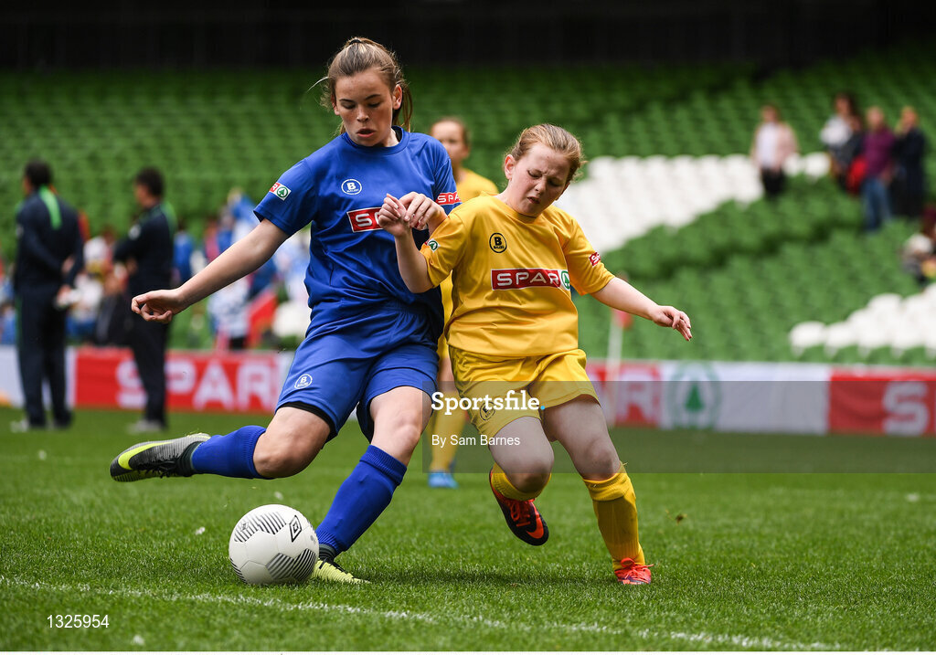 31 May 2017; Amber Cosgrove of Boyerstown NS, Co Meath, in action against Rachael NÍ Fhríl of Scoil Mhuire, Co Donegal, during the SPAR FAI Primary School 5s National Finals at Aviva Stadium, in Lansdowne Rd, Dublin 4. Photo by Sam Barnes/Sportsfile