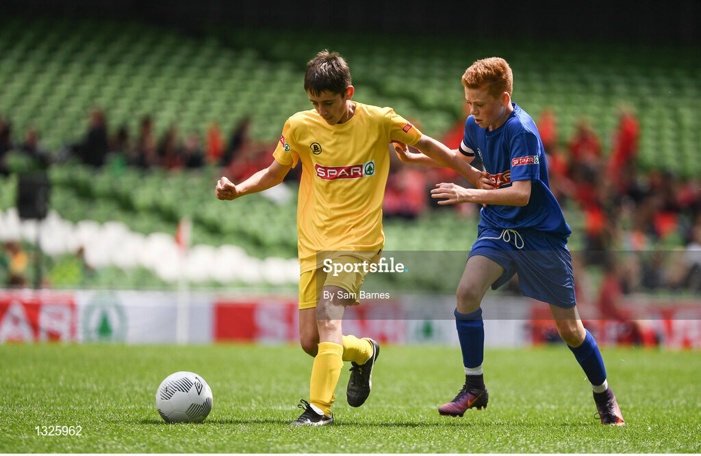 31 May 2017; Patrick Farrelly of Scoil Bhríde, Co Monaghan, in action against Killian Smyth of St Patrick's NS, Co Meath, during the SPAR FAI Primary School 5s National Finals at Aviva Stadium, in Lansdowne Rd, Dublin 4. Photo by Sam Barnes/Sportsfile