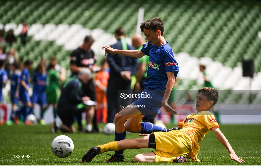 31 May 2017; Rían McConnell of St Patrick's NS, Co Meath, is tackled by Kian Duffy of Scoil Bhríde, Co Monaghan, during the SPAR FAI Primary School 5s National Finals at Aviva Stadium, in Lansdowne Rd, Dublin 4. Photo by Sam Barnes/Sportsfile