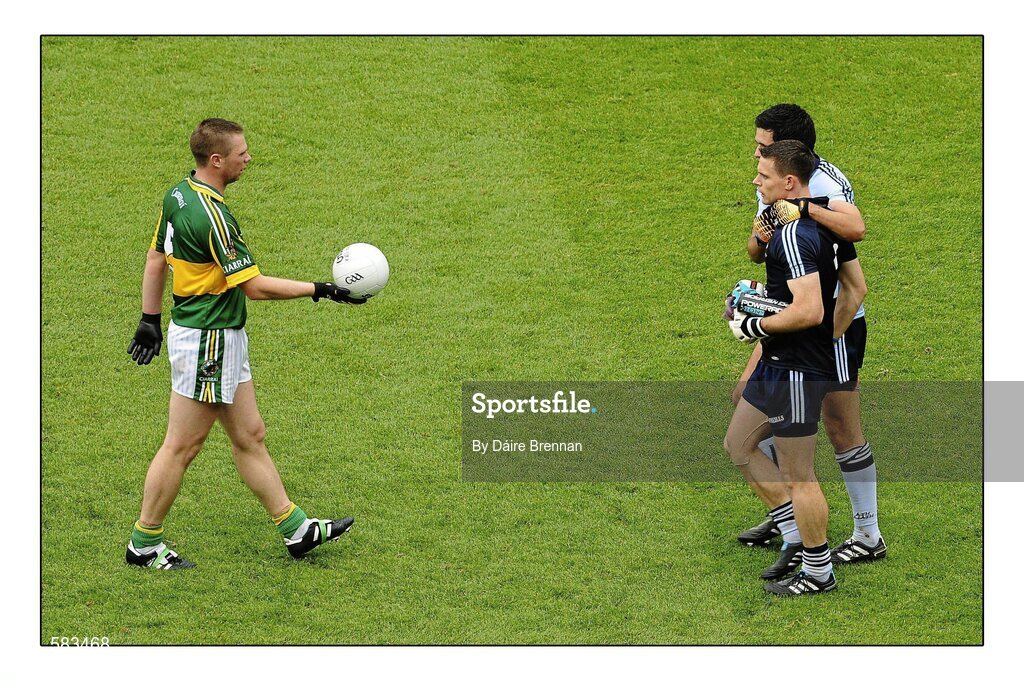 18 September 2011; Tomas O Se of Kerry offers the match ball to Stephen Cluxton of Dublin during the GAA Football All-Ireland Senior Championship Final match between Kerry and Dublin at Croke Park in Dublin. Photo by Dáire Brennan/Sportsfile