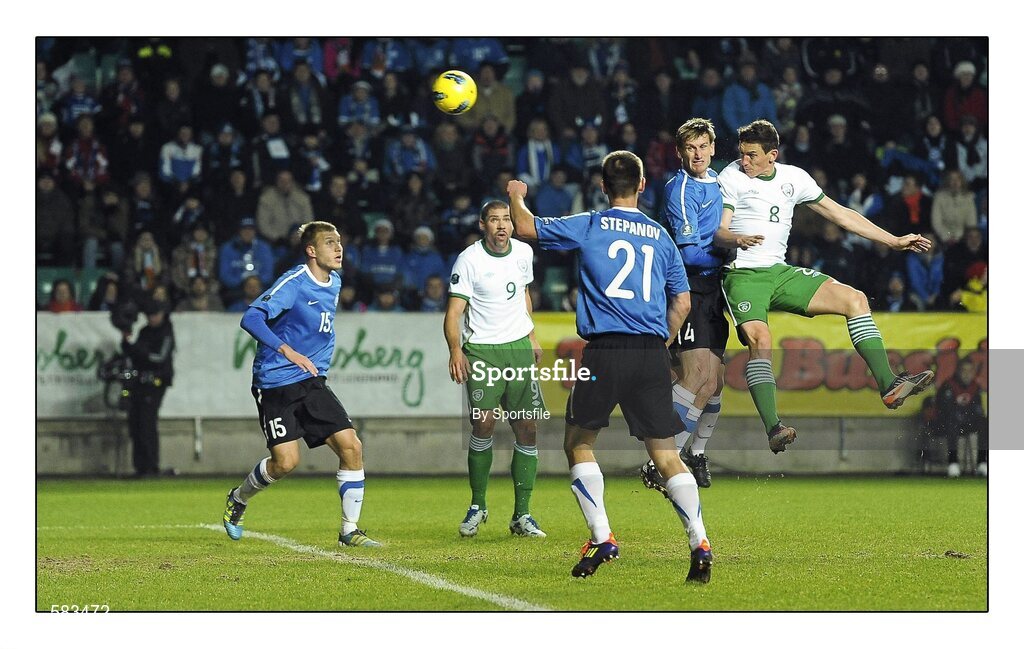 11 November 2011; Republic of Ireland's Keith Andrews heads to score his side's first goal, after thirteen minutes, despite the attempts of Estonia's Konstantin Vassiljev. UEFA EURO2012 Qualifying Play-off, 1st leg, Estonia v Republic of Ireland, Le Coq Arena, Tallinn, Estonia. Photo by Sportsfile