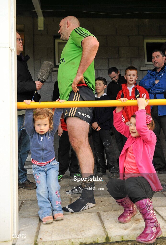 22 December 2011; Munster's John Hayes is interviewed for TV, alongside his daughters Roisin, aged 2 and a half, left, and Sally, aged 5, after a press conference ahead of their Celtic League game against Connacht on Monday. Munster Rugby Press Conference, Kilballyowen Park, Bruff, Co. Limerick. Picture credit: Diarmuid Greene / SPORTSFILE