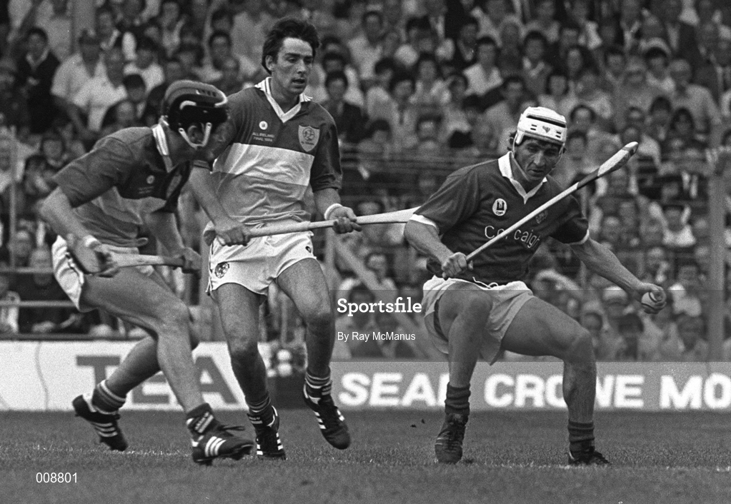 2 September 1984; John Fenton of Cork in action against Joachim Kelly of Offaly during the All-Ireland Senior Hurling Championship Final match between Cork and Offaly at Semple Stadium in Thurles, Tipperary. Photo by Ray McManus/Sporsfile