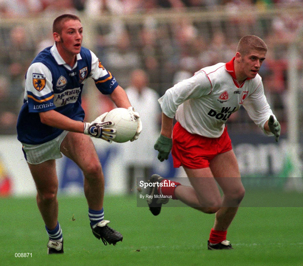 27 September 1998; Brian Fitzpatrick of Laois gets past Kevin Hughes of Tyrone during the All-Ireland Minor Football Championship Final between Laois and Tyrone at Croke Park in Dublin. Photo by Ray McManus/Sportsfile