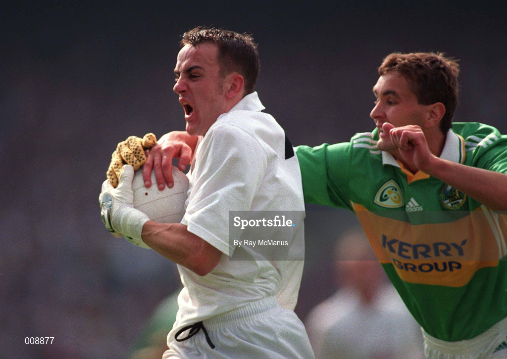 30 August 1998; Brian Lacey of Kildare in action against Maurice Fitzgerald of Kerry during the Bank of Ireland All-Ireland Senior Football Championship Semi-Final match between Kerry and Kildare at Croke Park in Dublin. Photo by Brendan Moran/Sportsfile