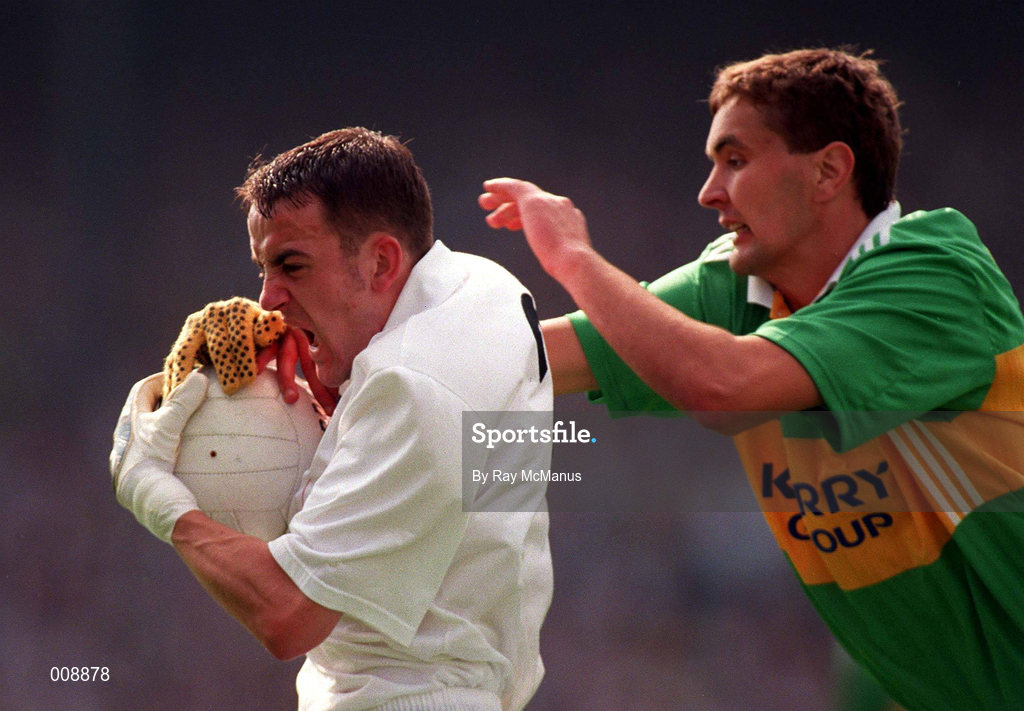 30 August 1998; Brian Lacey of Kildare in action against Maurice Fitzgerald of Kerry during the Bank of Ireland All-Ireland Senior Football Championship Semi-Final match between Kerry and Kildare at Croke Park in Dublin. Photo by Ray McManus/Sportsfile