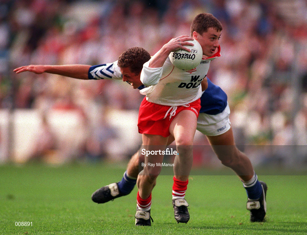 28 September 1998; Brian McGuigan ofTyrone is tackled by Kevin Hughes of Laois during the All-Ireland Minor Football Championship Final between Laois and Tyrone at Croke Park in Dublin. Photo by Ray McManus/Sportsfile