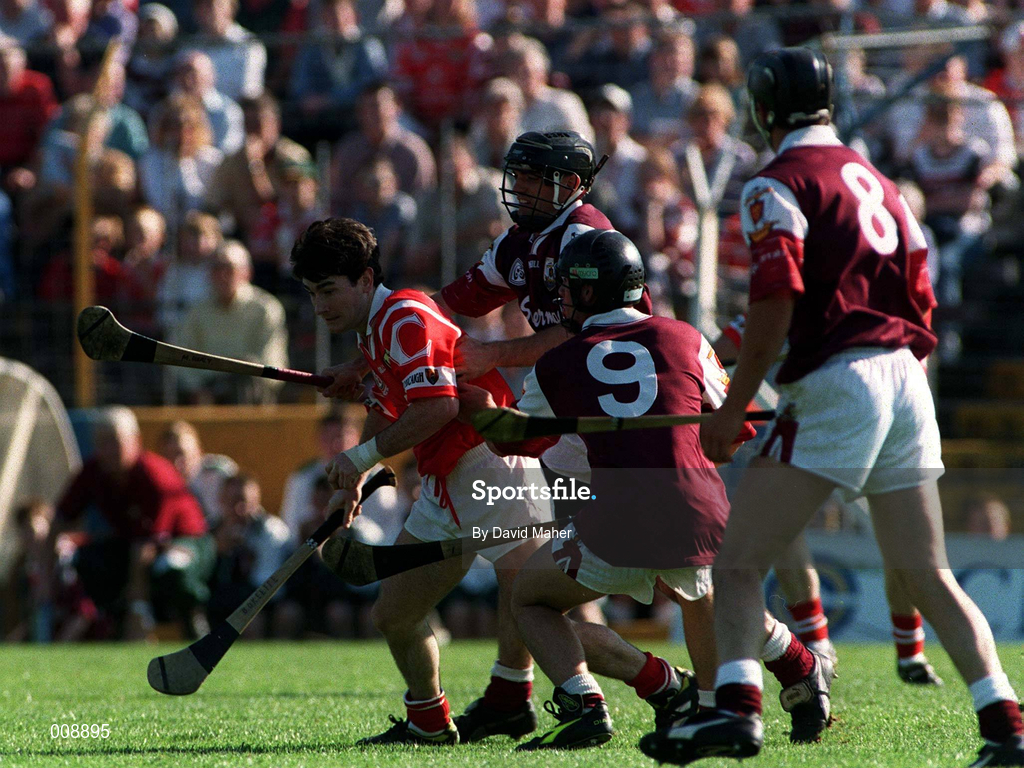 20 September 1998; Brian O'Keeffe of Cork in action against Galway players, from left, Alan Kerins, Michael Healy, 9, and Padraic Walshe, 8, during the All-Ireland U21 Hurling Championship Final match between Cork and Galway at Semple Stadium in Thurles, Tipperary. Photo by David Maher/Sportsfile