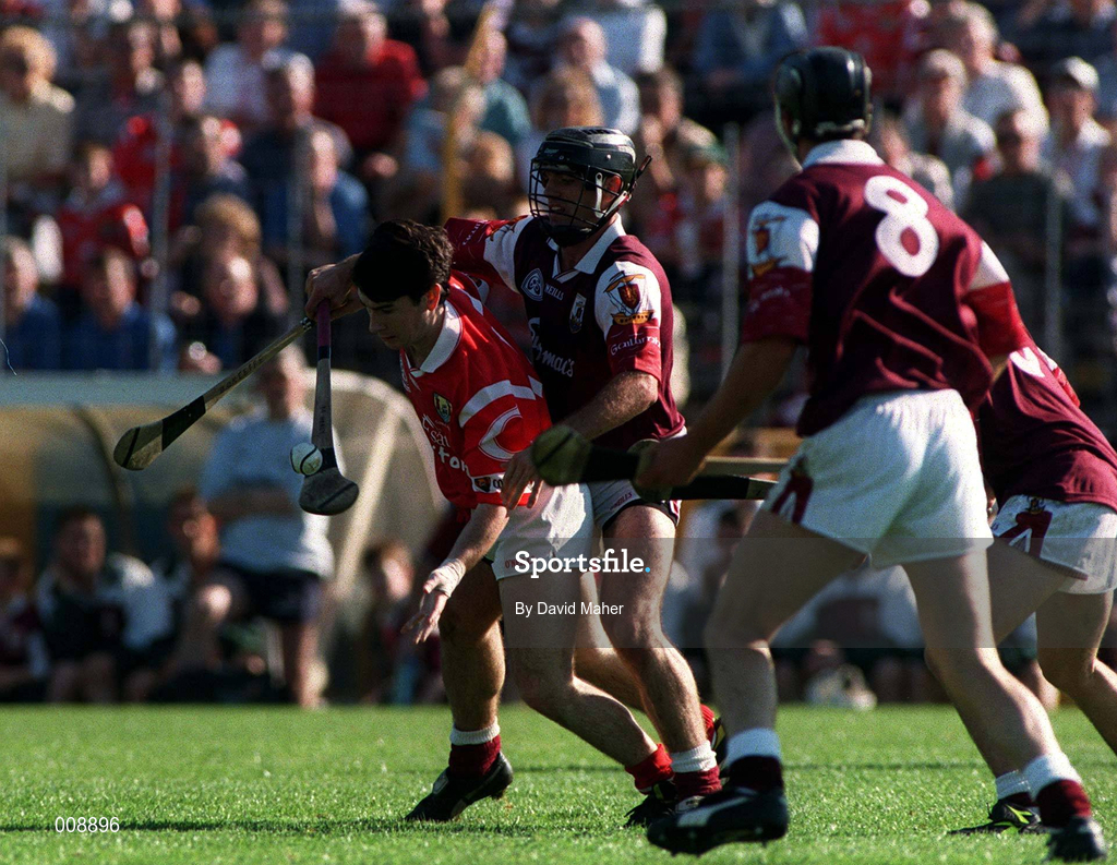20 September 1998; Brian O'Keeffe of Cork in action against Galway players, from left, Alan Kerins, Michael Healy, and Padraic Walshe, 8, during the All-Ireland U21 Hurling Championship Final match between Cork and Galway at Semple Stadium in Thurles, Tipperary. Photo by David Maher/Sportsfile