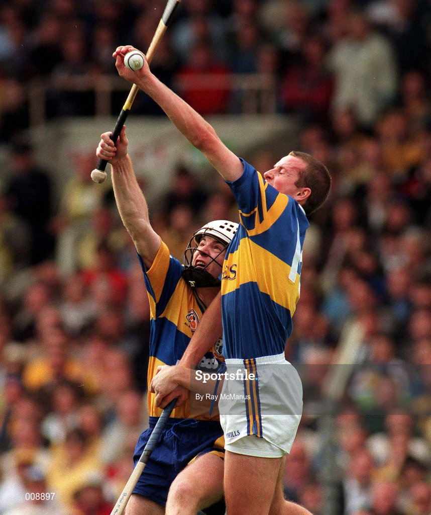 14 September 1997; Brian O'Meara of Tipperary in a tussle for possession with Michael O'Halloran of Clare during the Guinness All-Ireland Hurling Championship Final match between Clare and Tipperary at Croke Park in Dublin. Photo by Ray McManus/Sportsfile