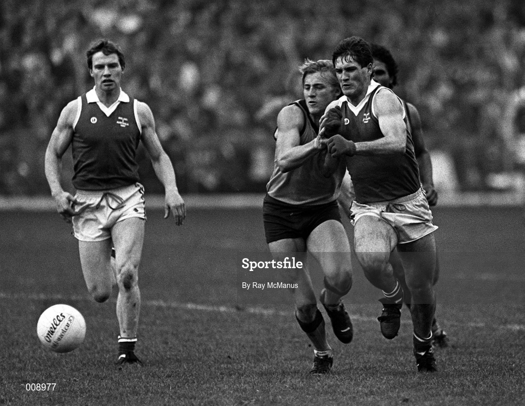 1 November 1987; Richard Osbourne of Australia, in a race for possession with Dermot McNicholi of Ireland during the International Rules Series Third Test match between Ireland and Australia at Croke Park in Dublin. Photo by Ray McManus/Sportsfile