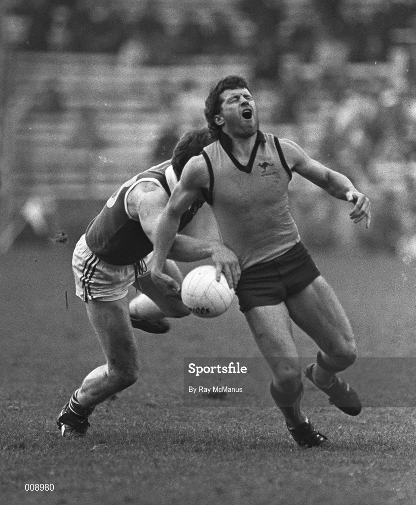1 November 1987; Brian Royal of Australia is tackled by Pat Byrne of Ireland during the International Rules Series Third Test match between Ireland and Australia at Croke Park in Dublin. Photo by Ray McManus/Sportsfile
