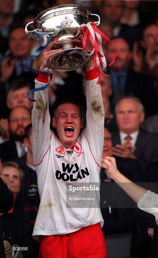 27 September 1998; Tyrone captain Cormac McAnallen lifts the Tom Markham Cup after the All-Ireland Minor Football Championship Final between Laois and Tyrone at Croke Park in Dublin. Photo by Matt Browne/Sportsfile
