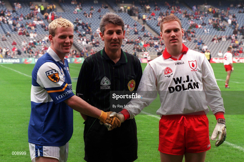 27 September 1998. Referee Michael Curley with team captains Johnny Behan of Laois and Cormac McAnallen of Tyrone before the All-Ireland Minor Football Championship Final between Laois and Tyrone at Croke Park in Dublin. Photo by Ray McManus/Sportsfile
