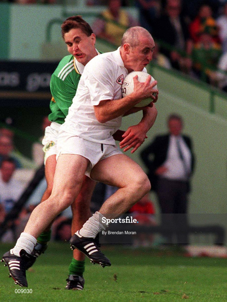 30 August 1998; Davy Dalton of Kildare in action against Maurice Fitzgerald of Kerry during the Bank of Ireland All-Ireland Senior Football Championship Semi-Final match between Kerry and Kildare at Croke Park in Dublin. Photo by Brendan Moran/Sportsfile