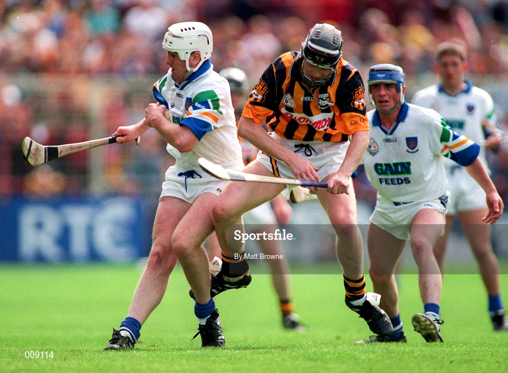 16 August 1998; Fergal Hartley of Waterford  in action against Peter Barry of Kilkenny during the Guinness All-Ireland Senior Hurling Championship Semi-Final match between Kilkenny and Waterford at Croke Park in Dublin. Photo by Matt Browne/SPORTSFILE