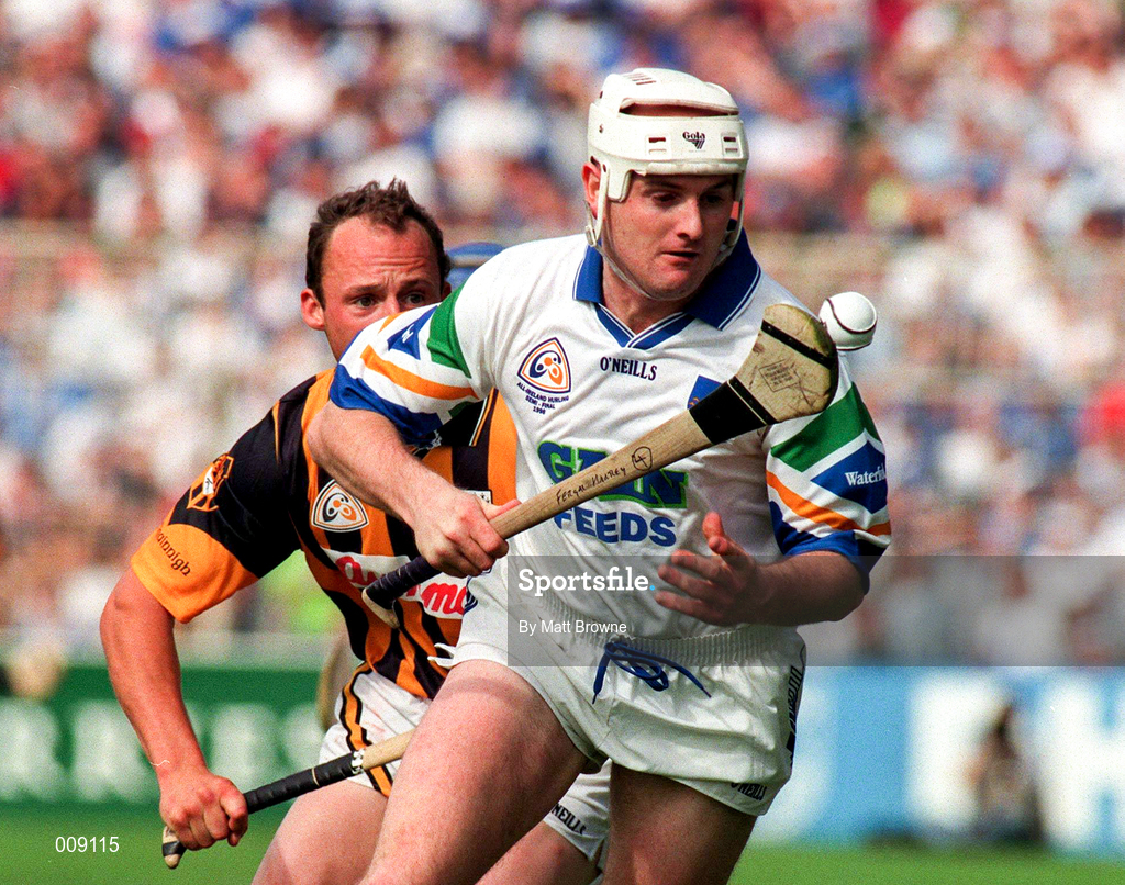 16 August 1998; Fergal Hartley of Waterford  in action against Andy Comerford of Kilkenny during the Guinness All-Ireland Senior Hurling Championship Semi-Final match between Kilkenny and Waterford at Croke Park in Dublin. Photo by Matt Browne/SPORTSFILE