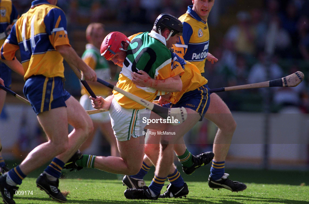 22 August 1998; Brian Lohan of Clare fouls Joe Errity of Offaly to give away a penalty during the Guinness All-Ireland Hurling All-Ireland Senior Championship Semi-Final Replay match between Clare and Offaly at Croke Park in Dublin. Photo by Ray McManus/Sportsfile