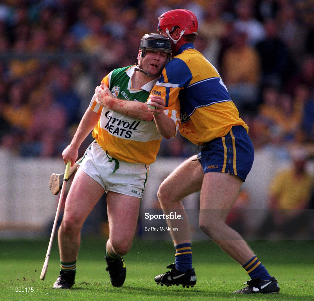 22 August 1998; Joe Erritty of Offaly in action against Brian Lohan of Clare during the Guinness All-Ireland Hurling All-Ireland Senior Championship Semi-Final Replay match between Clare and Offaly at Croke Park in Dublin. Photo by Ray McManus/Sportsfile