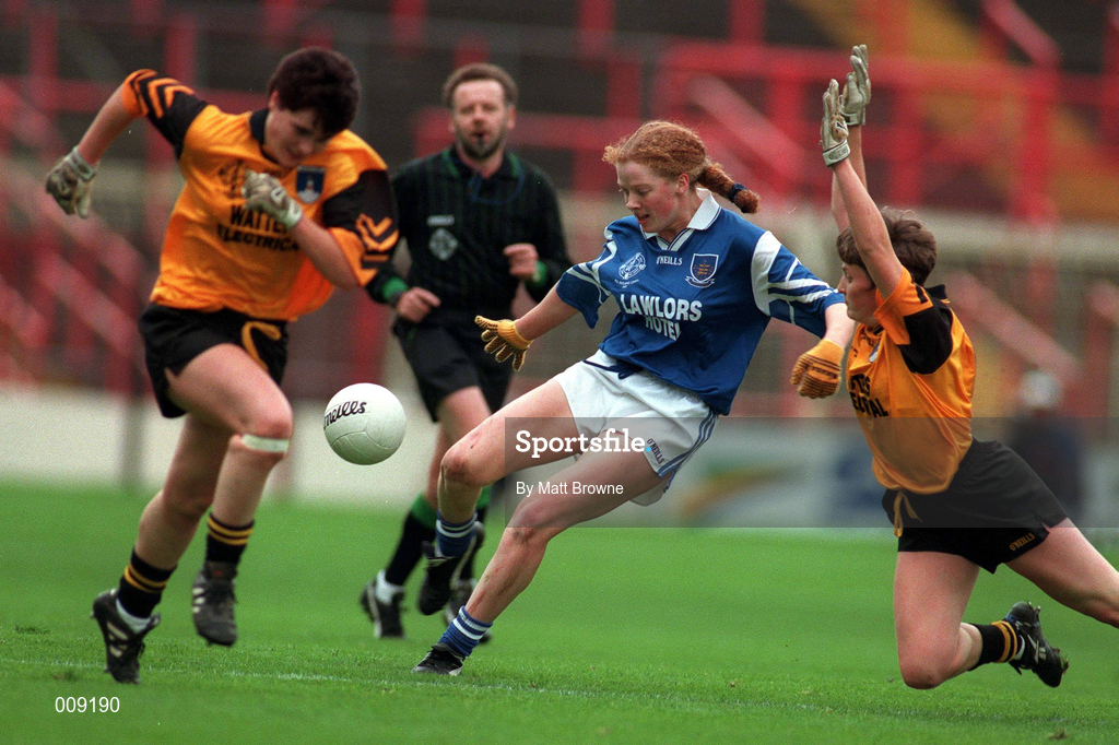 12 October 1997; Geraldine O'Ryan of Waterford in action against Brenda McAnespie of Monaghan during the All-Ireland Senior Ladies Football Championship Final between Monaghan and Waterford at Croke Park in Dublin. Photo by Matt Browne/Sportsfile