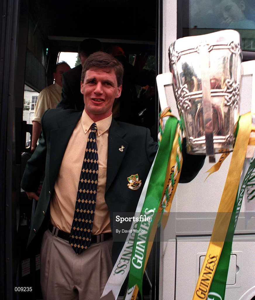 13 September 1998; Offaly captain Hubert Rigney, holds the Liam MacCarthy Cup aloft upon the team arrival at the Burlington Hotel after the Guinness All-Ireland Senior Hurling Championship Final match between Kilkenny and Offaly at Croke Park in Dublin. Photo by David Maher/Sportsfile