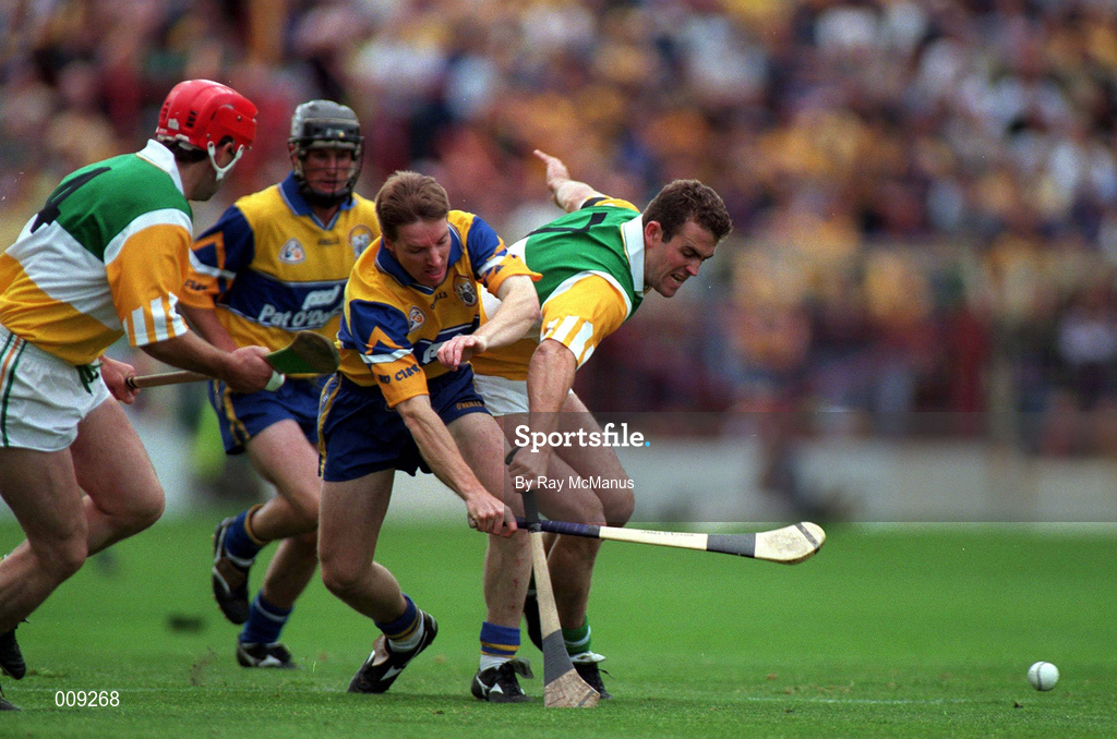 22 August 1998; Kevin Martin of Offaly in action against Jamesie O'Connor of Clare during the Guinness All-Ireland Hurling All-Ireland Senior Championship Semi-Final Replay match between Clare and Offaly at Croke Park in Dublin. Photo by Ray McManus/Sportsfile