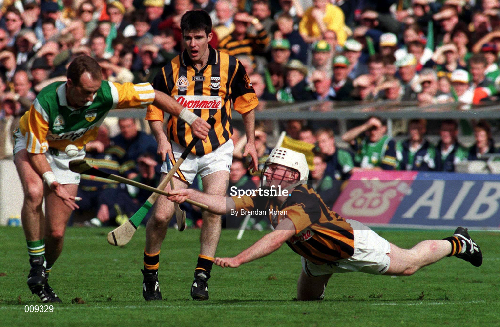 13 September 1998; Joe Dooley of Offaly is tackled by Tom Hickey of Kilkenny, as Philly Larkin, centre, looks on during the Guinness All-Ireland Senior Hurling Championship Final match between Kilkenny and Offaly at Croke Park in Dublin. Photo by Brendan Moran/Sportsfile