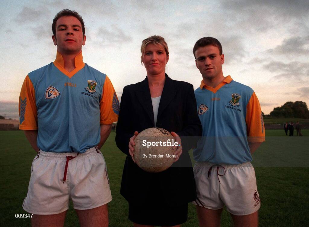 16 September 1998; John Divilly, left, and Derek Savage who both play for Galway and UCD, with Susan Feerick of AIB Bank after a Galway senior football squad training session at Tuam Stadium in Tuam, Galway. Photo by Brendan Moran/Sportsfile