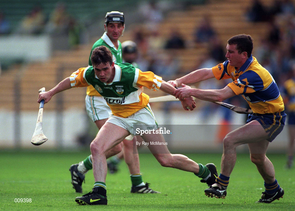 22 August 1998; Johnny Pilkington of Offaly in action against Brian Quinn of Clare during the Guinness All-Ireland Hurling All-Ireland Senior Championship Semi-Final Replay match between Clare and Offaly at Croke Park in Dublin. Photo by Ray McManus/Sportsfile