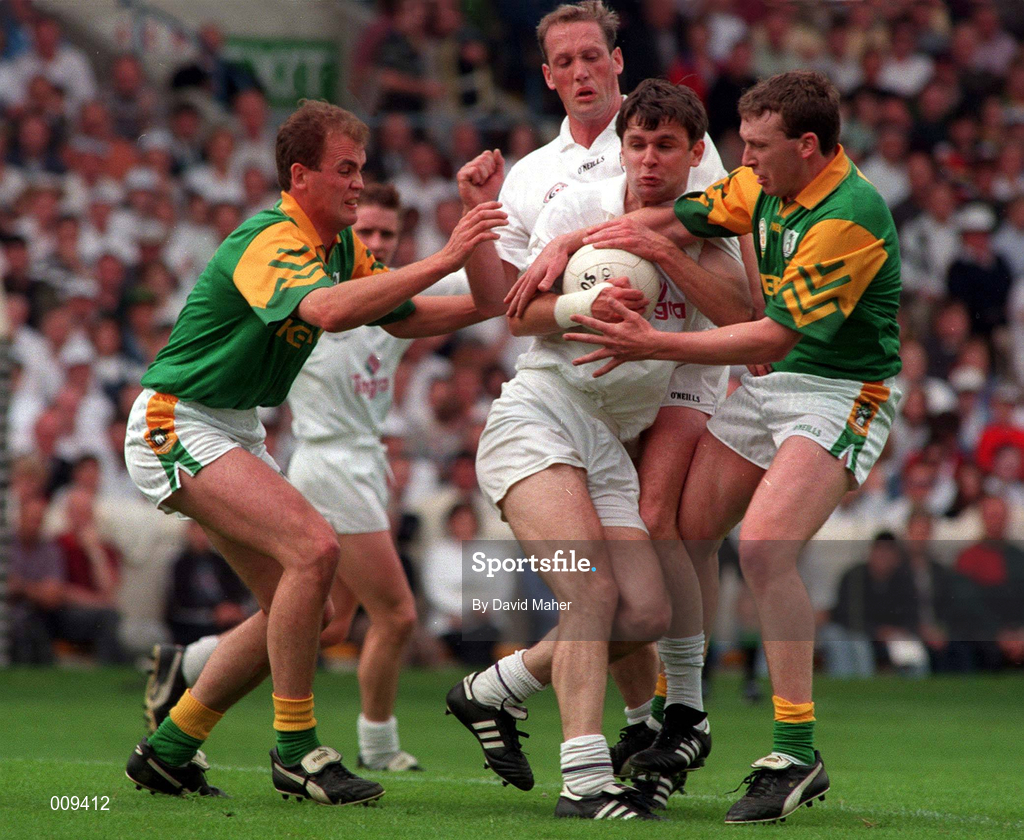 2 August 1998; Karl O'Dwyer of Kildare, supported by team-mate Willie McCreery, behind, in action against John McDermott, left, and Barry Callaghan of Meath during the Bank of Ireland Leinster Senior Football Championship Final match between Kildare and Meath at Croke Park in Dublin. Photo by David Maher/Sportsfile