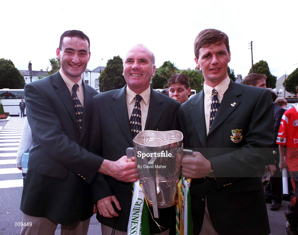13 September 1998; Offaly manager Michael Bond, centre, team captain Hubert Rigney, right, and full-back Kevin Kinahan with the Liam MacCarthy Cup upon the team arrival at the Burlington Hotel after the Guinness All-Ireland Senior Hurling Championship Final match between Kilkenny and Offaly at Croke Park in Dublin. Photo by David Maher/Sportsfile